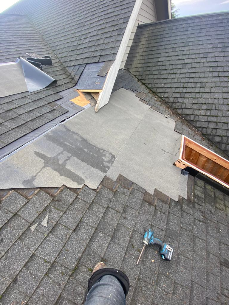 Old roof with leak needing repair in Surrey